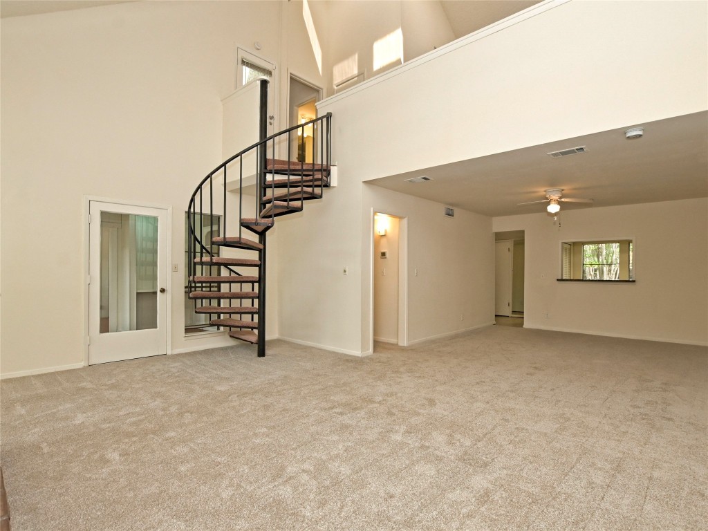 3 Casa Verde Street Lakeway, TX 78734 - Photo 4 of 30 a view of an empty room with a window
