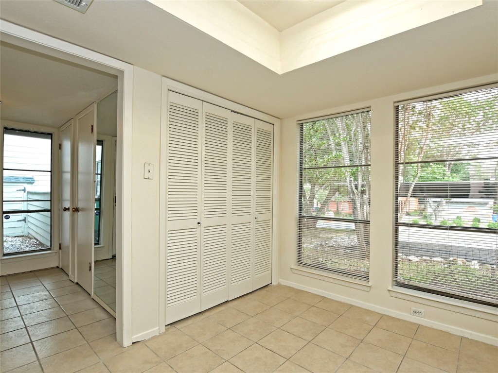 3 Casa Verde Street Lakeway, TX 78734 - Photo 10 of 30 an empty room with windows