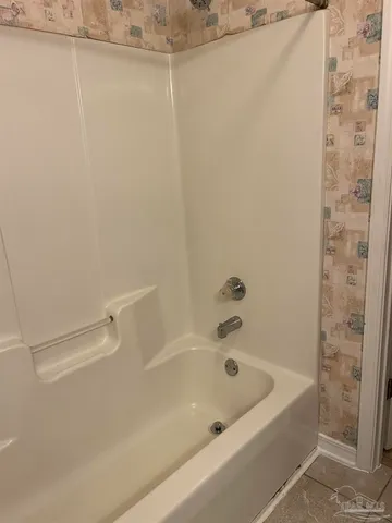 a bathroom with a bathtub