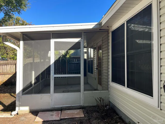 a view of backyard with green space