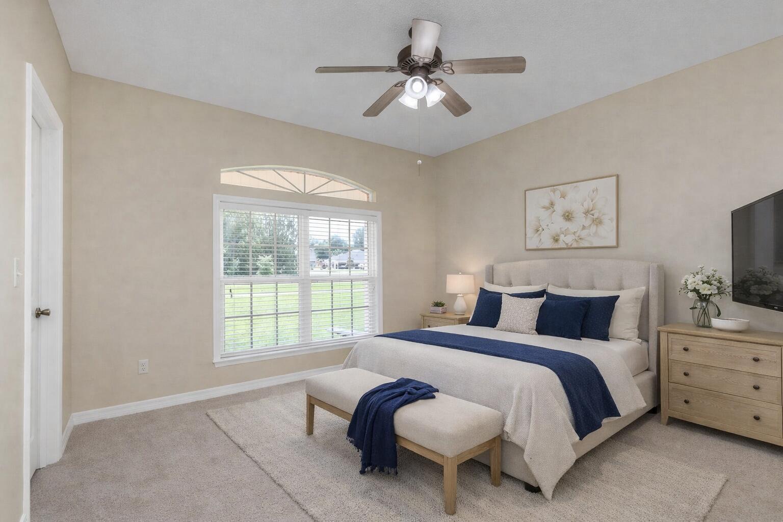 5552 Frontier Drive Crestview, FL 32536 - Photo 37 of 54 a bedroom with a large bed and a window