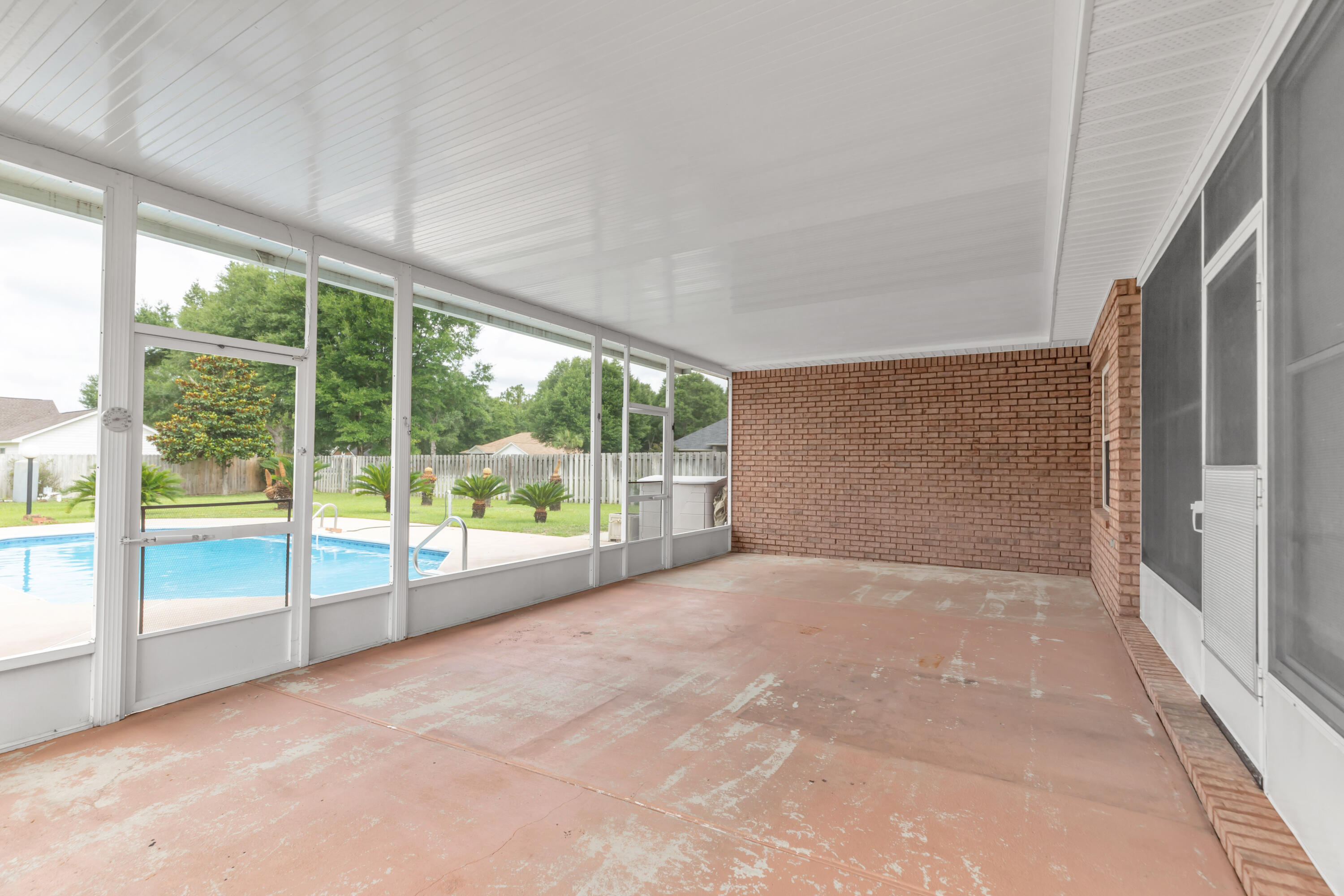 5552 Frontier Drive Crestview, FL 32536 - Photo 48 of 54 a view of an empty room with windows