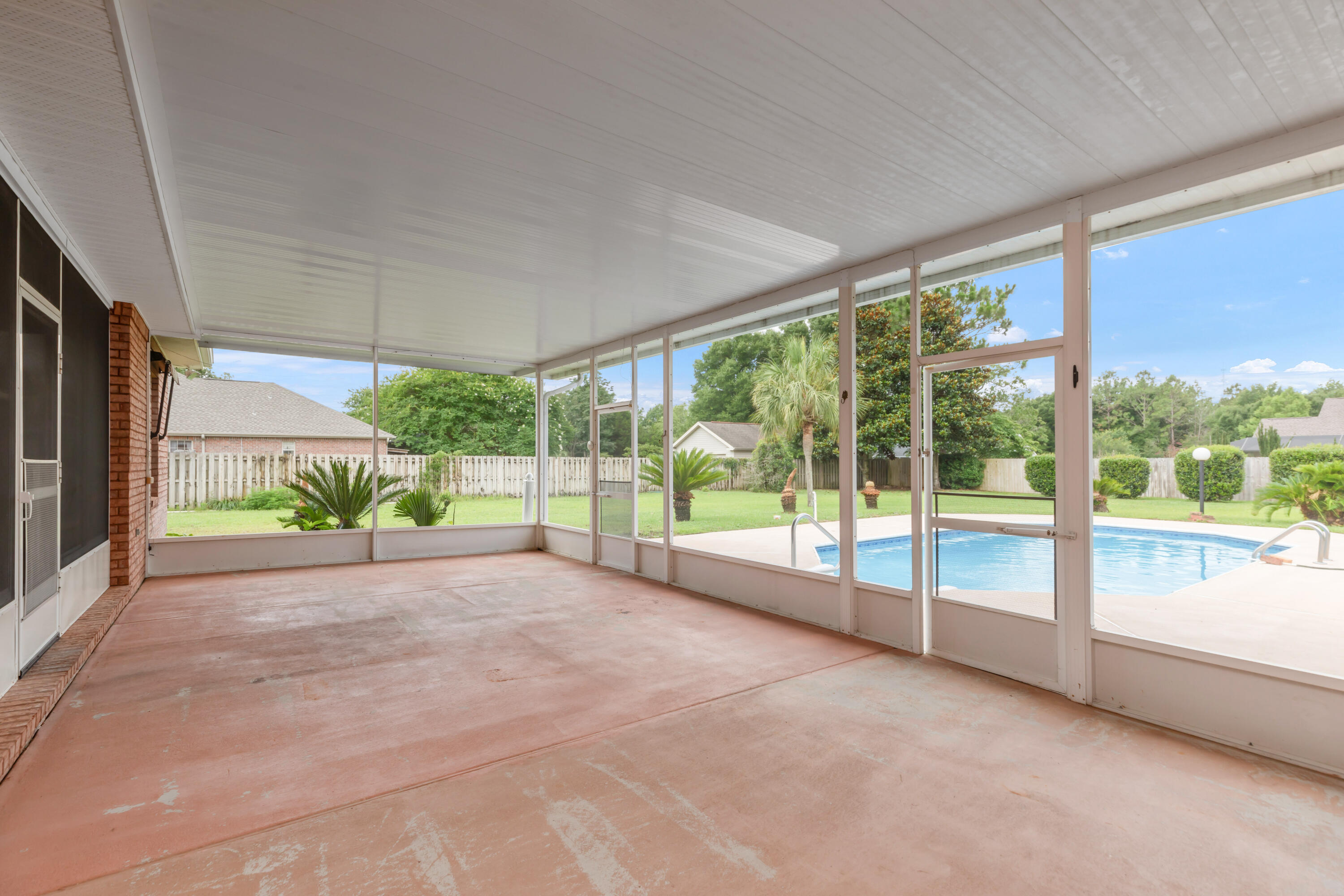 5552 Frontier Drive Crestview, FL 32536 - Photo 49 of 54 a view of a house with a big yard and large tree