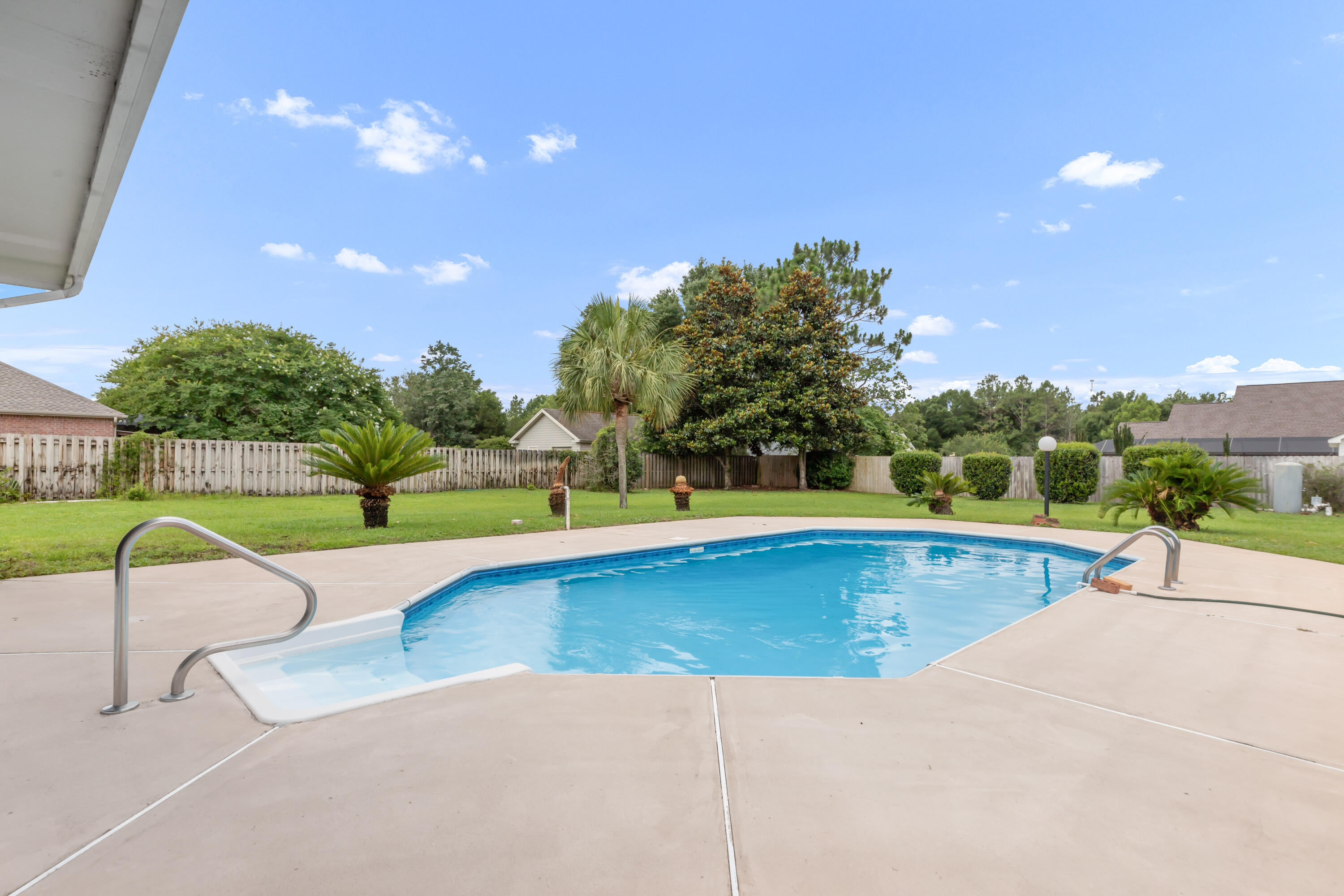 5552 Frontier Drive Crestview, FL 32536 - Photo 6 of 54 a view of swimming pool with a yard