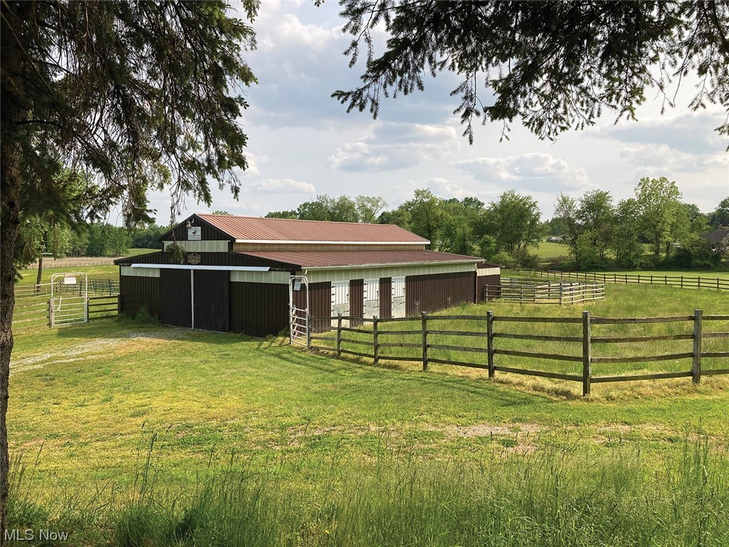 1525 Hartville Road Atwater, OH 44201 - Photo 6 of 18 View of horse stable and fenced pasture