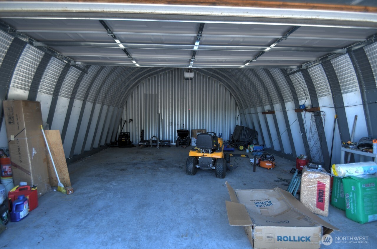 5922 184th Lane Southwest Rochester, WA 98579 - Photo 26 of 34 a view of storage and utility room with a small yard