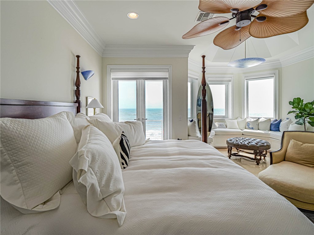 2250 Sanderling Lane Vero Beach, FL 32963 - Photo 15 of 36 a bedroom with a bed and a chandelier