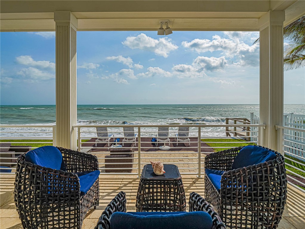2250 Sanderling Lane Vero Beach, FL 32963 - Photo 23 of 36 a view of a balcony with wooden floor and outdoor space