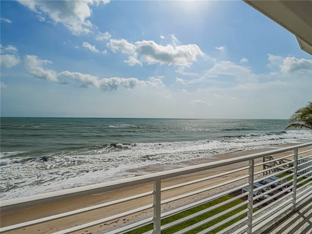 a view of beach and ocean