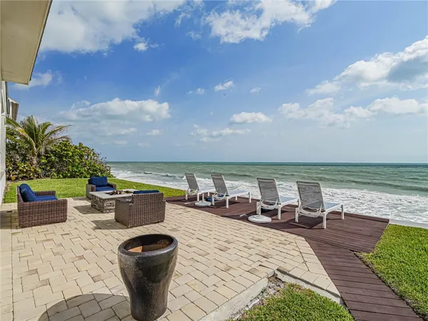 a view of a terrace with furniture