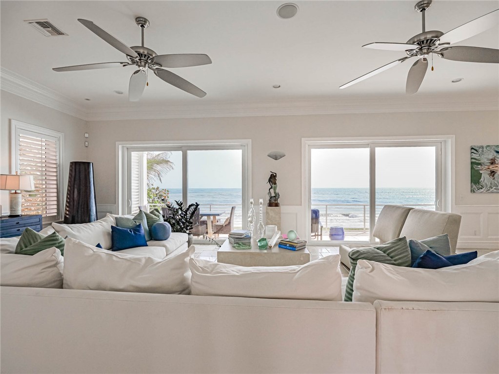 2250 Sanderling Lane Vero Beach, FL 32963 - Photo 6 of 36 a living room with furniture and a large window
