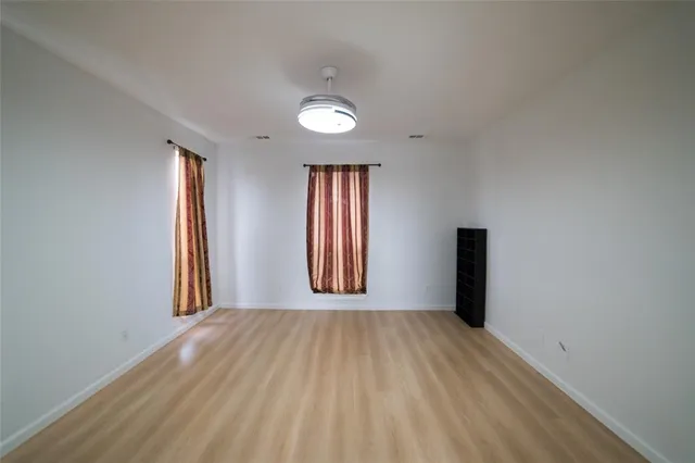 wooden floor and windows in a room