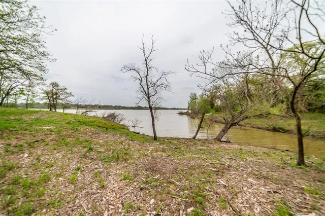 a view of a lake with outdoor space