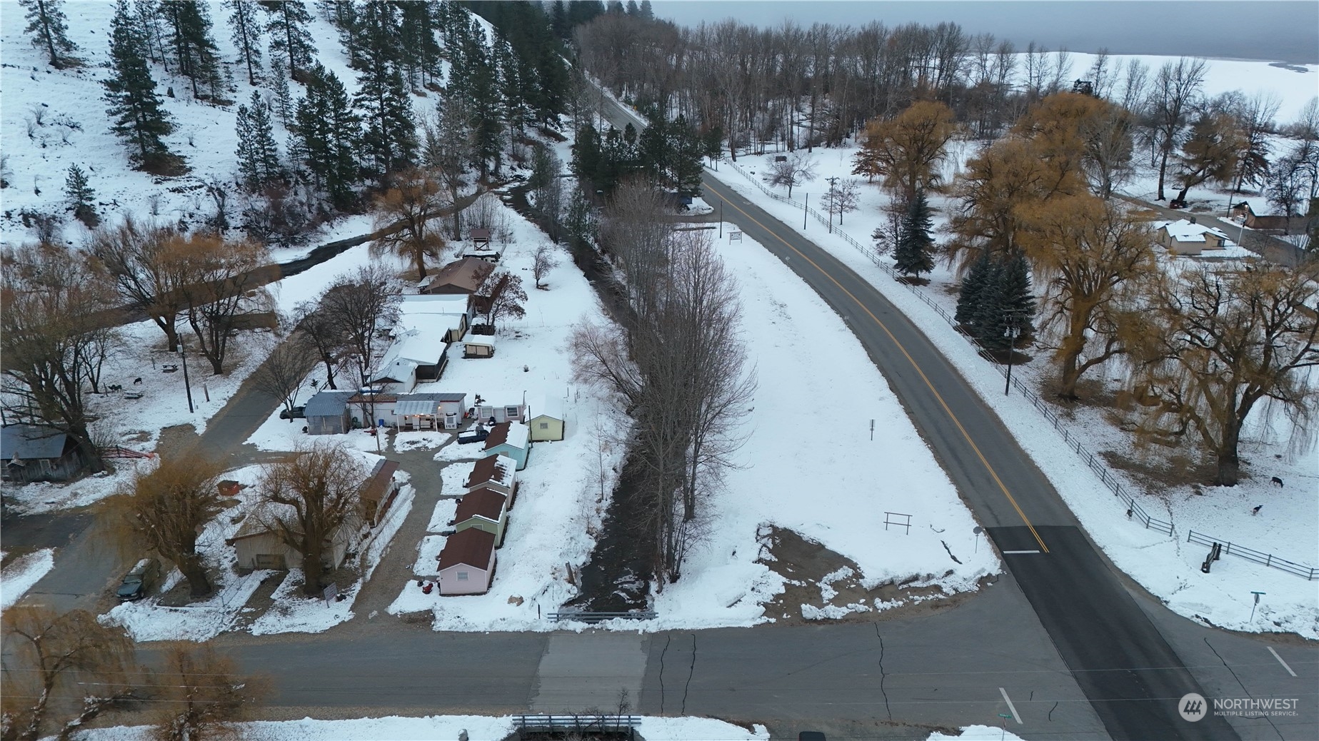-xx1 North Main Street Conconully, WA 98819 - Photo 2 of 35 a view of a yard with wooden fence