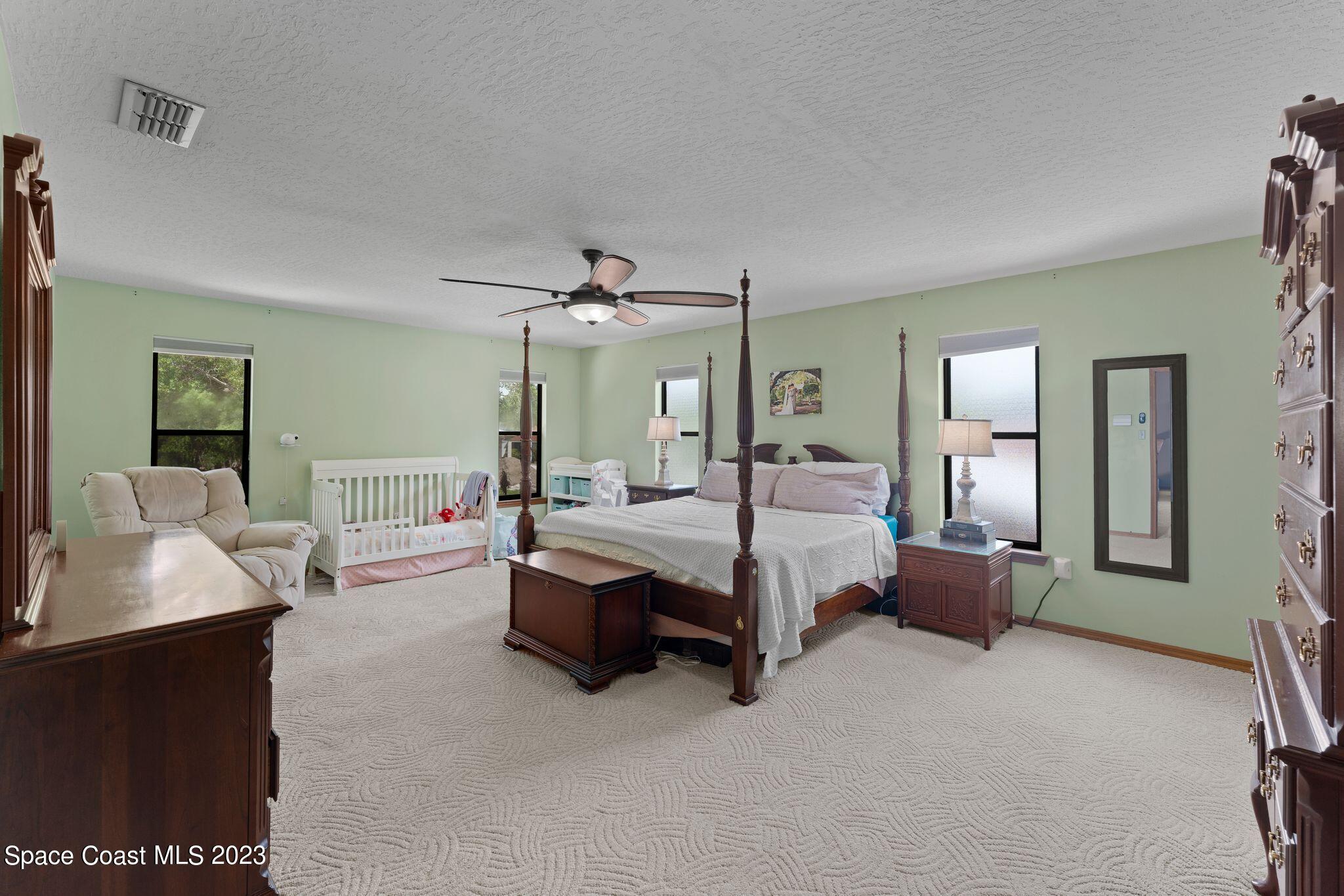 3704 Windsor Drive Cocoa, FL 32926 - Photo 26 of 48 a bedroom with bed and window