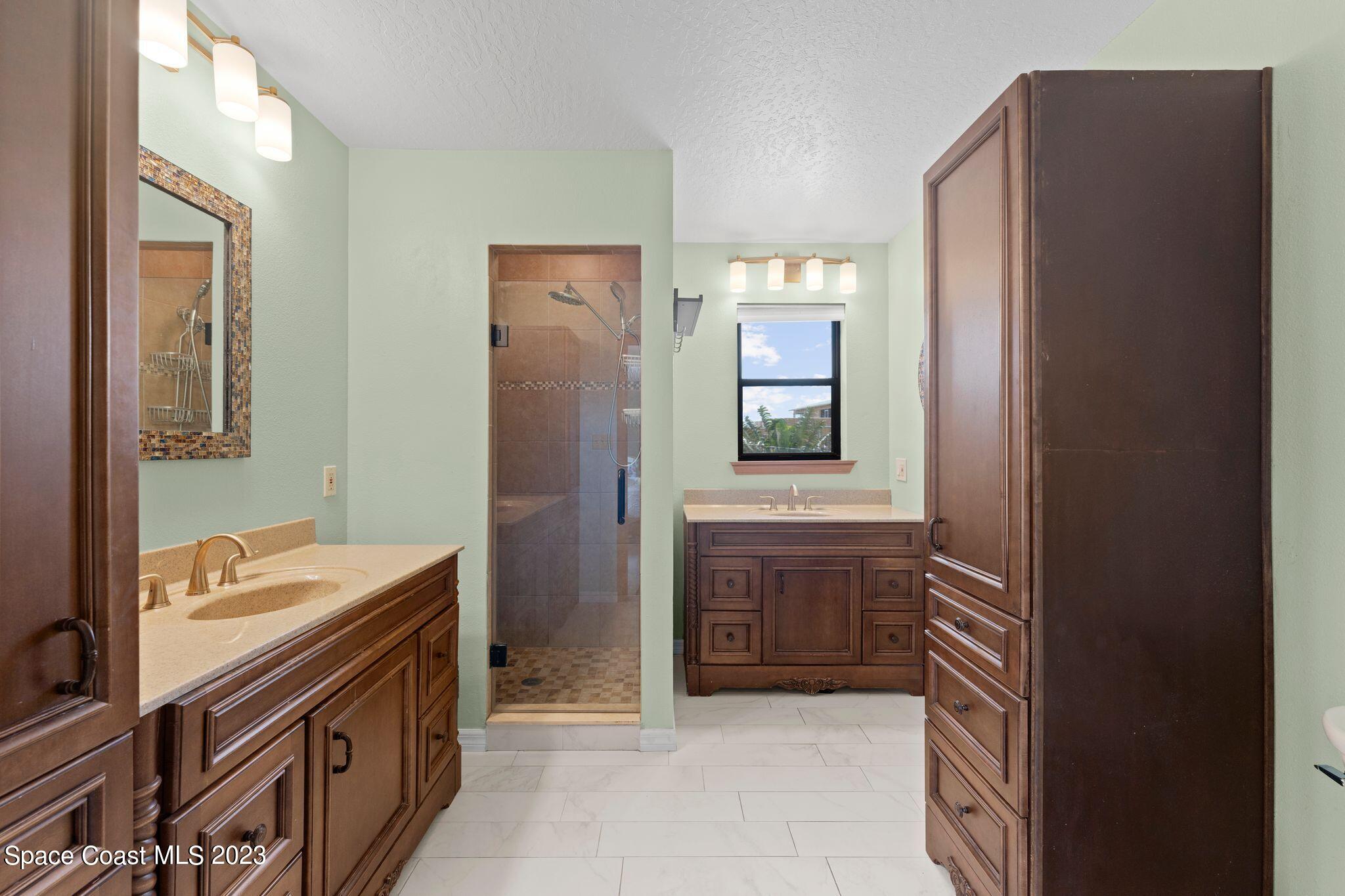 3704 Windsor Drive Cocoa, FL 32926 - Photo 28 of 48 a bathroom with a sink a mirror and a toilet