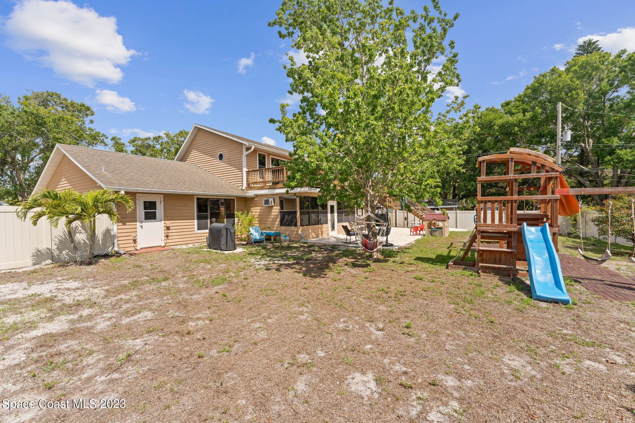 3704 Windsor Drive Cocoa, FL 32926 - Photo 40 of 48 a view of a house with backyard