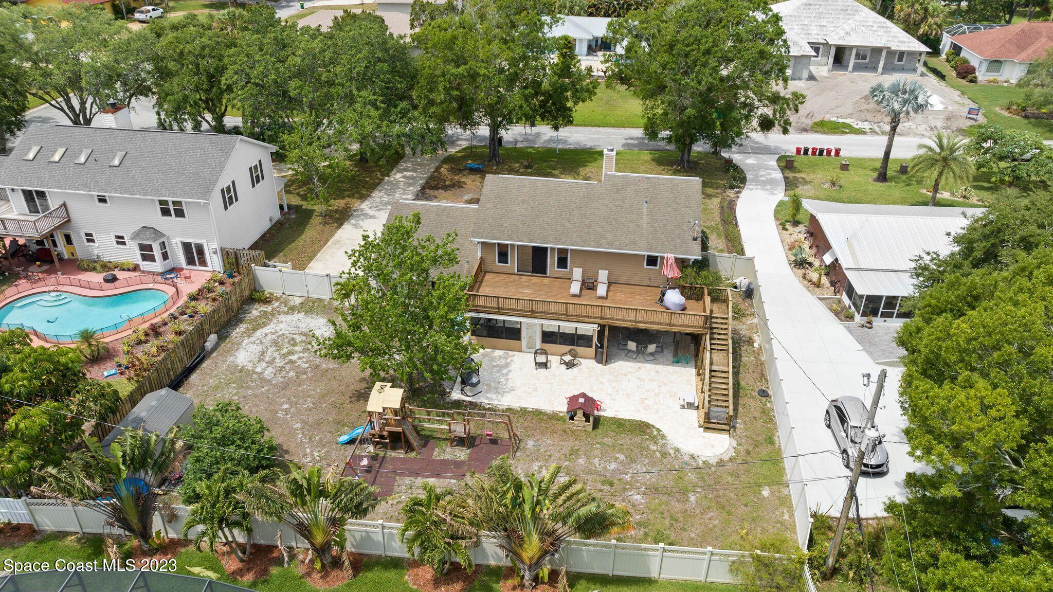 3704 Windsor Drive Cocoa, FL 32926 - Photo 45 of 48 an aerial view of residential houses with outdoor space