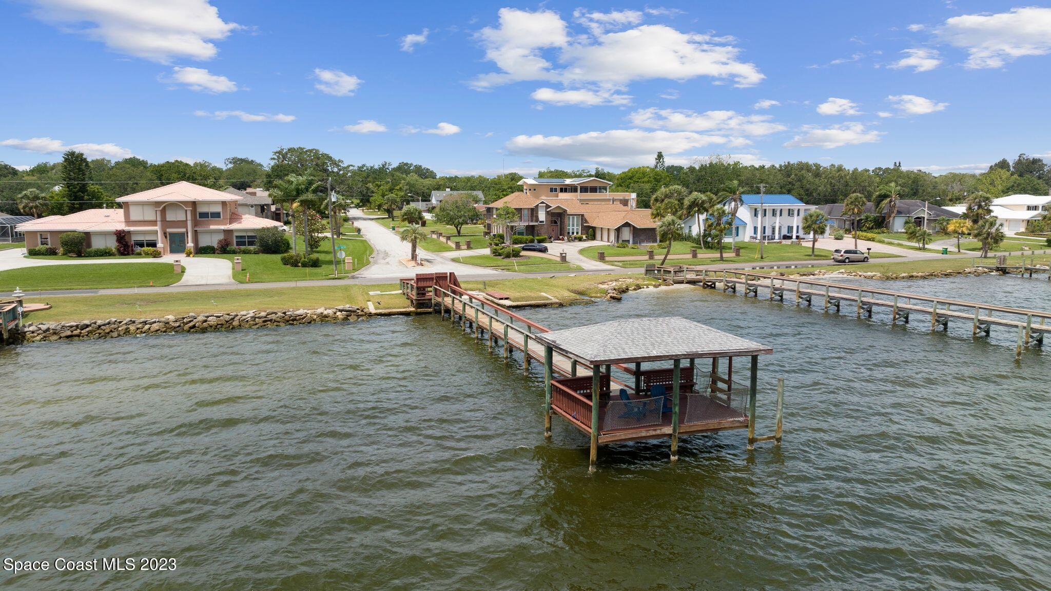 3704 Windsor Drive Cocoa, FL 32926 - Photo 48 of 48 a swimming pool view with a lake view
