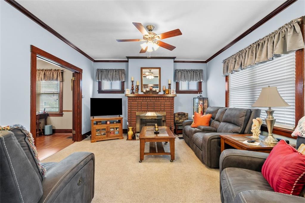 1170 Midland Beaver Road Industry, PA 15052 - Photo 13 of 34 a living room with furniture ceiling fan and a window