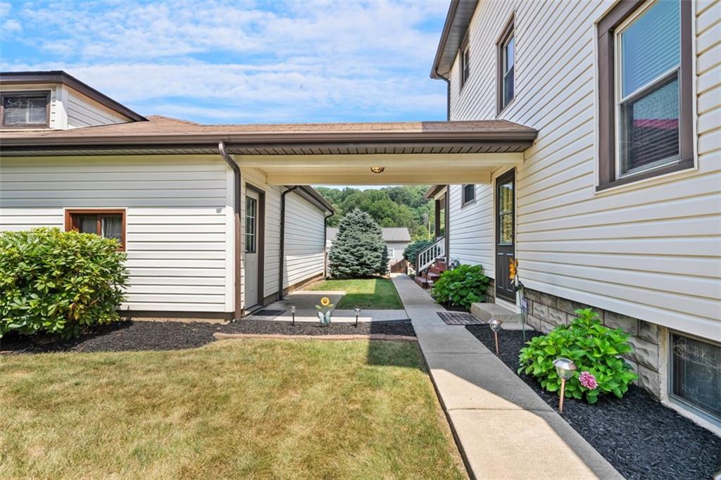 1170 Midland Beaver Road Industry, PA 15052 - Photo 32 of 34 a view of yellow house with potted plants