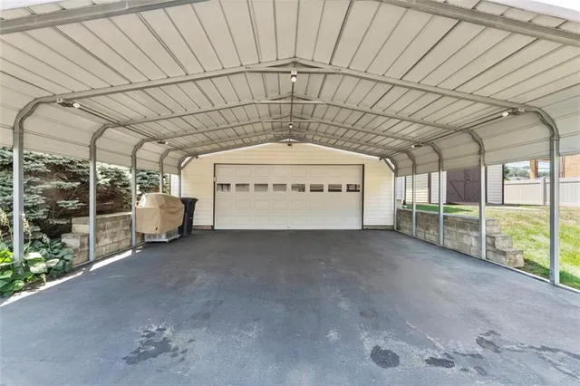 a view of a big room with wooden walls