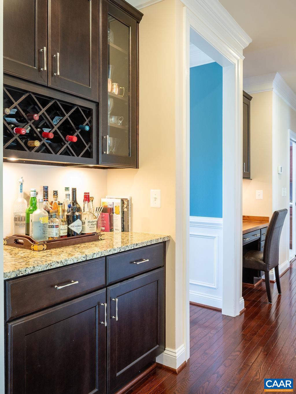 2706 Lockerbie Lane Keswick, VA 22947 - Photo 10 of 55 a kitchen with stainless steel appliances granite countertop a sink dishwasher and cabinets with wooden floor