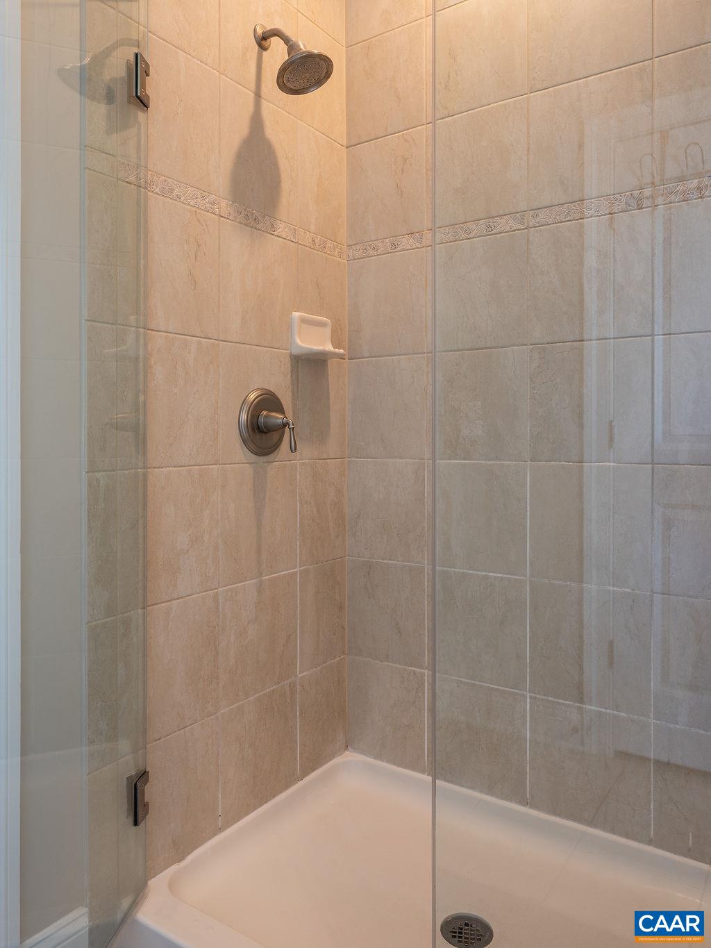 2706 Lockerbie Lane Keswick, VA 22947 - Photo 23 of 55 a bathroom with a shower