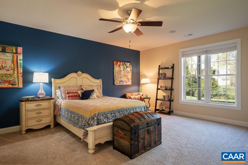 2706 Lockerbie Lane Keswick, VA 22947 - Photo 34 of 55 a bedroom with a bed and window