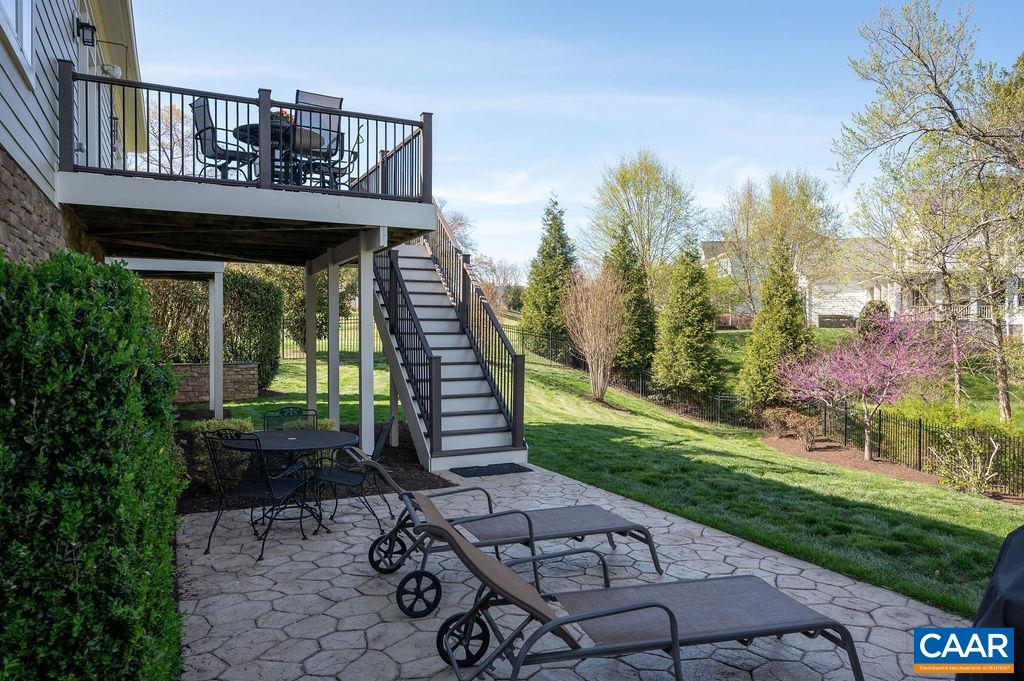 2706 Lockerbie Lane Keswick, VA 22947 - Photo 37 of 55 a view of a house with backyard and sitting area