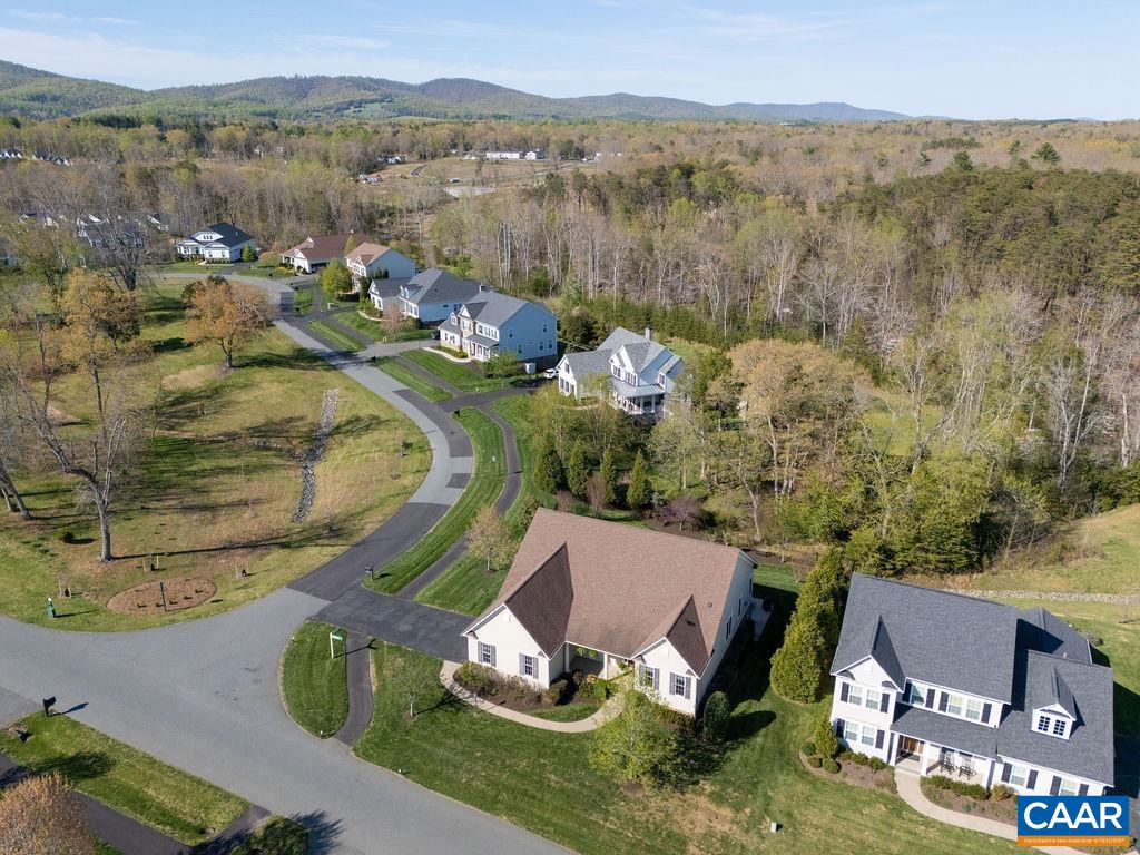 2706 Lockerbie Lane Keswick, VA 22947 - Photo 42 of 55 an aerial view of a house with a lake view
