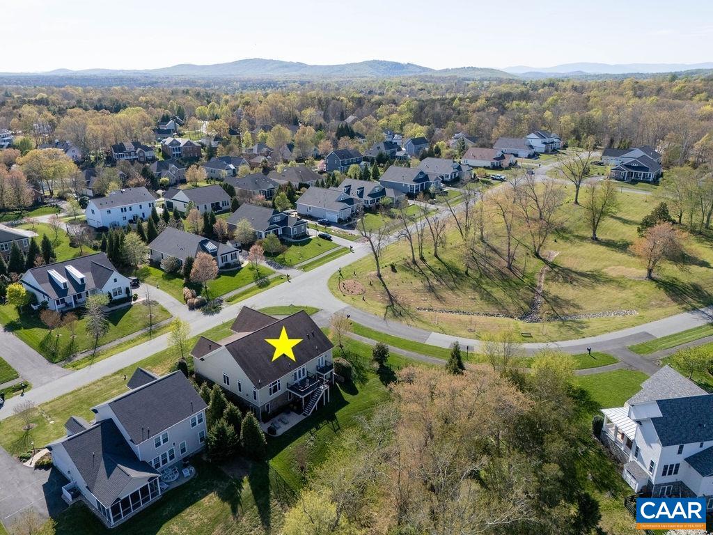 2706 Lockerbie Lane Keswick, VA 22947 - Photo 47 of 55 an aerial view of a house with a swimming pool