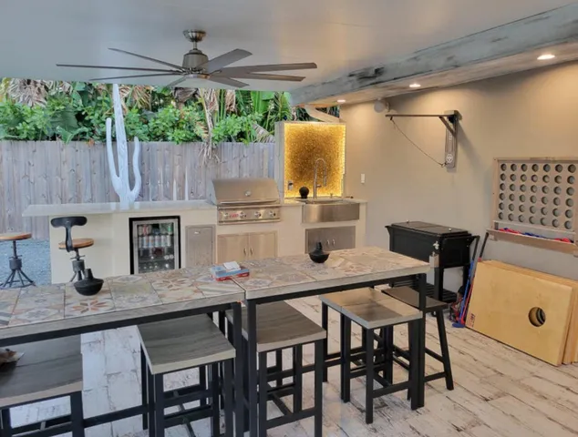 a view of a swimming pool with a yard