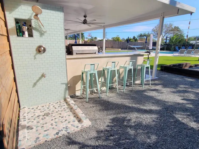 a spacious bedroom with a bed and a window