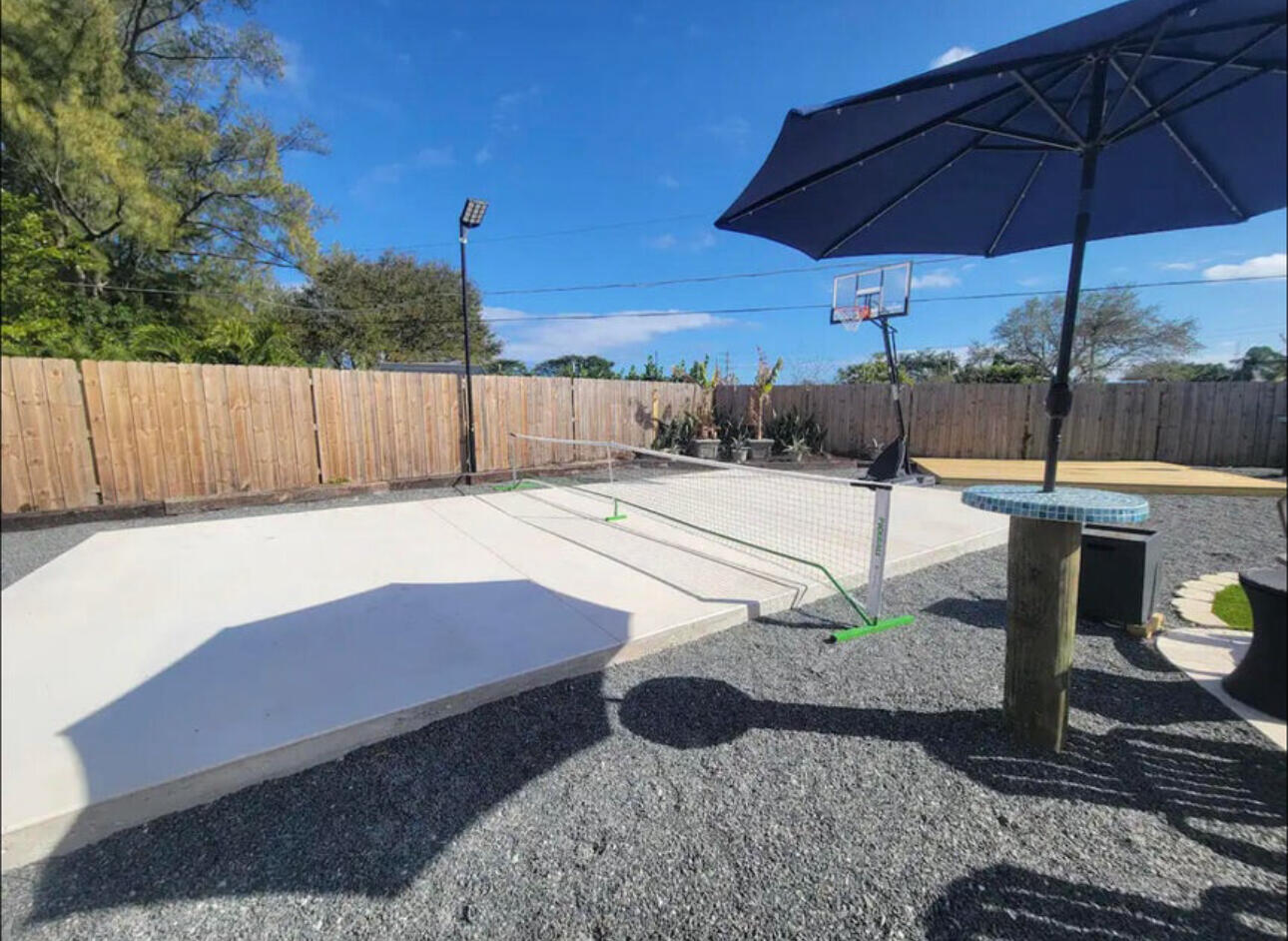 270 Northwest 36th Street Boca Raton, FL 33431 - Photo 44 of 82 a view of a backyard and sitting area