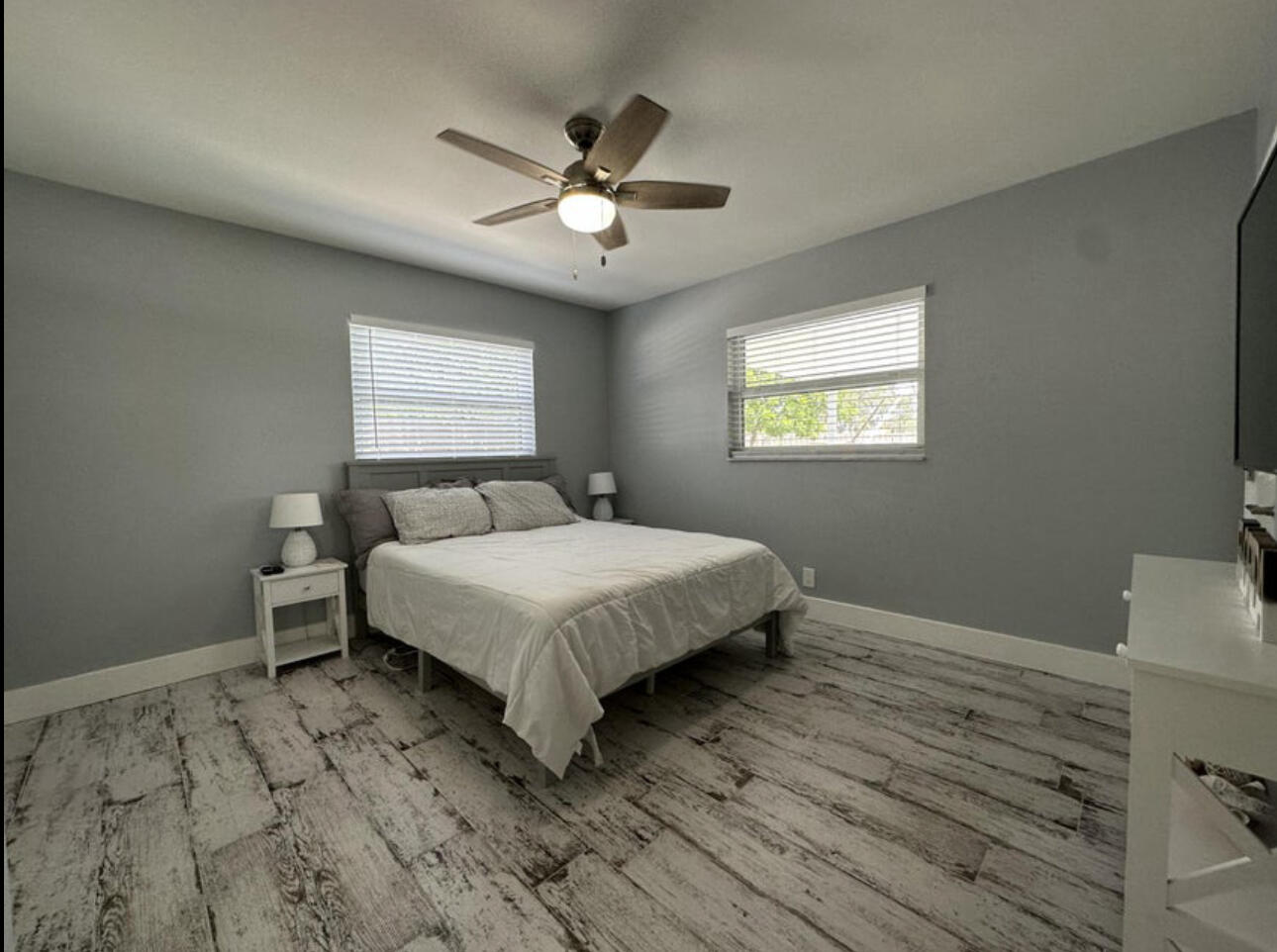 270 Northwest 36th Street Boca Raton, FL 33431 - Photo 60 of 82 a spacious bedroom with a bed and a window