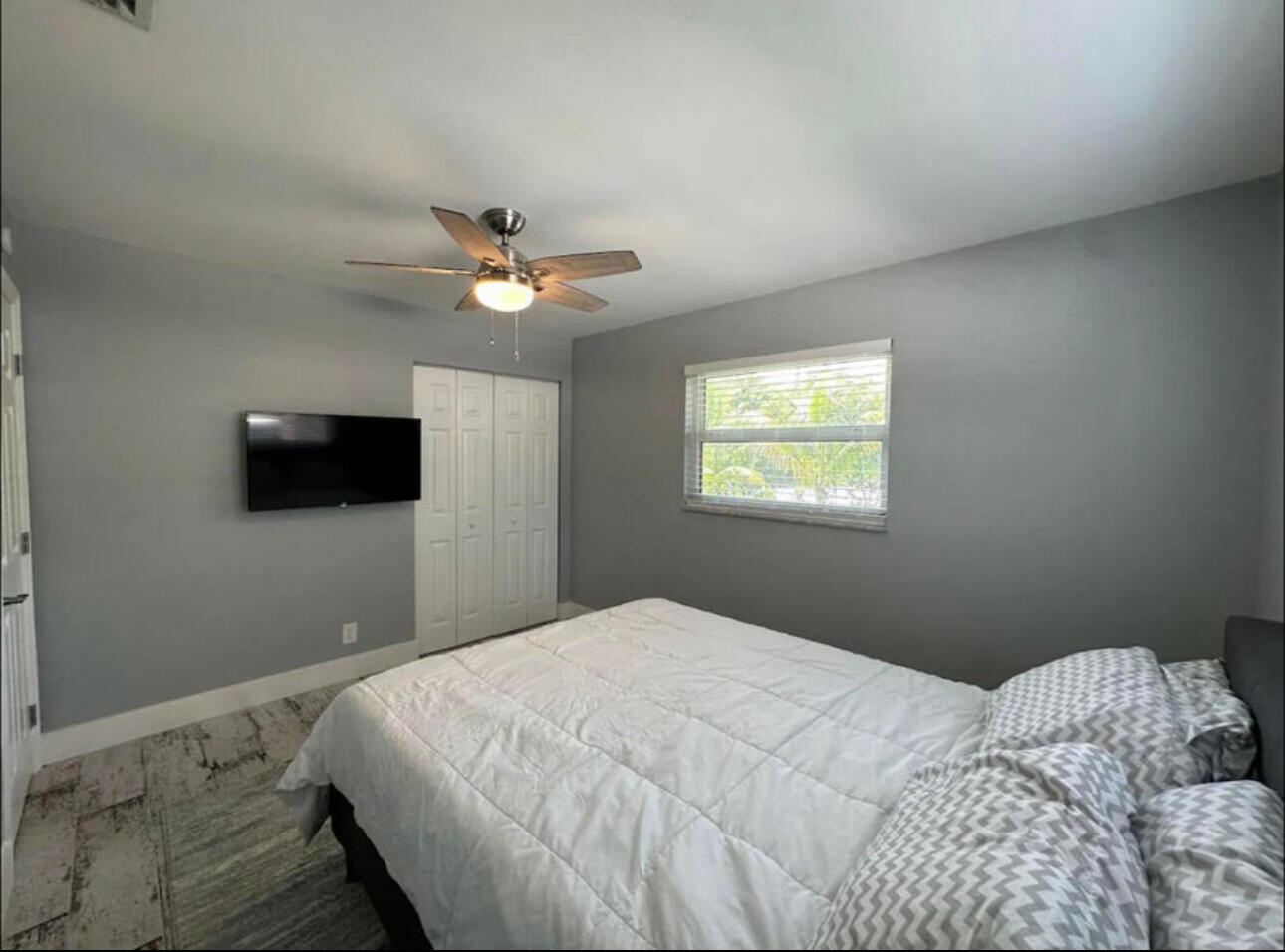 270 Northwest 36th Street Boca Raton, FL 33431 - Photo 67 of 82 a bedroom with a bed and a window