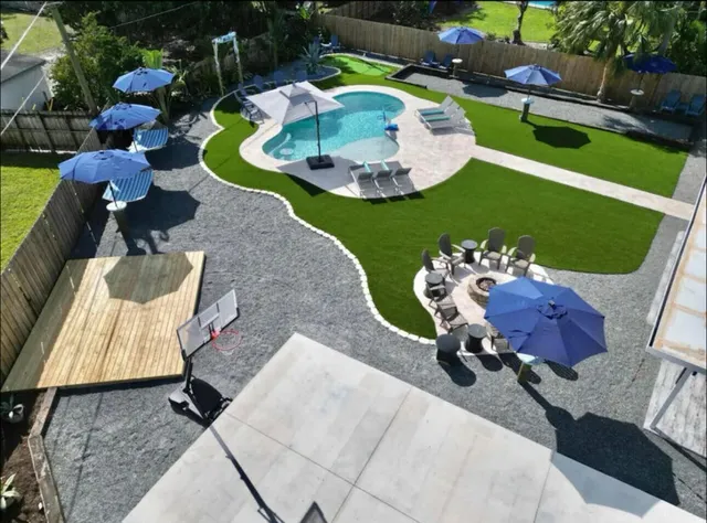 a view of a chairs and table in the patio