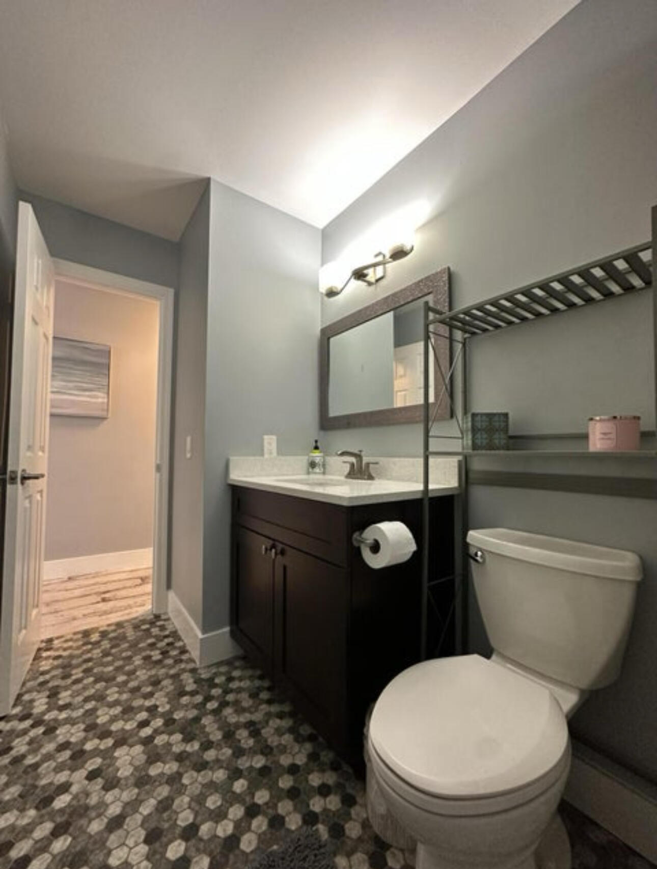 270 Northwest 36th Street Boca Raton, FL 33431 - Photo 77 of 82 a bathroom with a toilet a sink and mirror