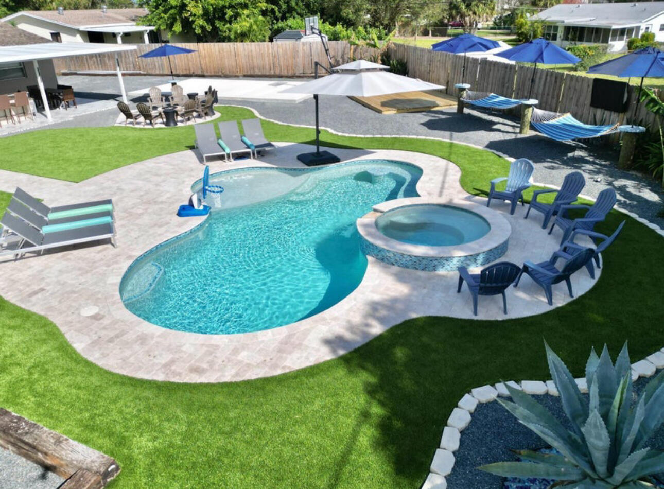 270 Northwest 36th Street Boca Raton, FL 33431 - Photo 79 of 82 a view of a swimming pool with a patio