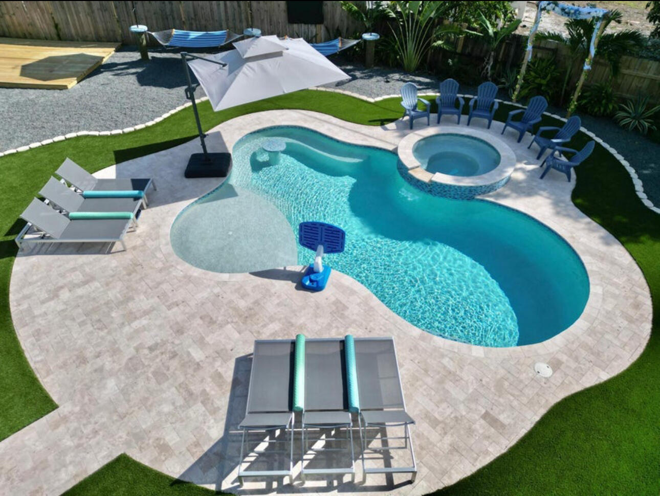 270 Northwest 36th Street Boca Raton, FL 33431 - Photo 80 of 82 a view of a swimming pool with sitting area