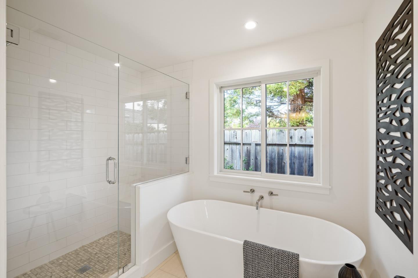 1642 Anamor Street Redwood City, CA 94061 - Photo 16 of 19 a bathroom with a bathtub and a shower