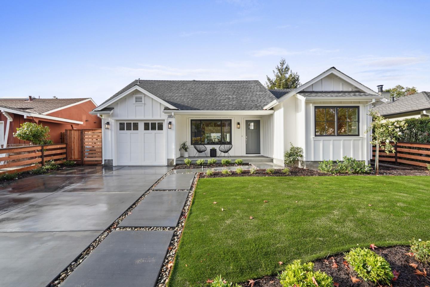1642 Anamor Street Redwood City, CA 94061 - Photo 19 of 19 a front view of a house with a yard and garage