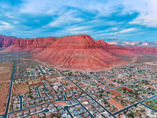 210 Talon Court Ivins, UT 84738 - Photo 51 of 60 Aerial perspective of suburban area featuring a mountainous background