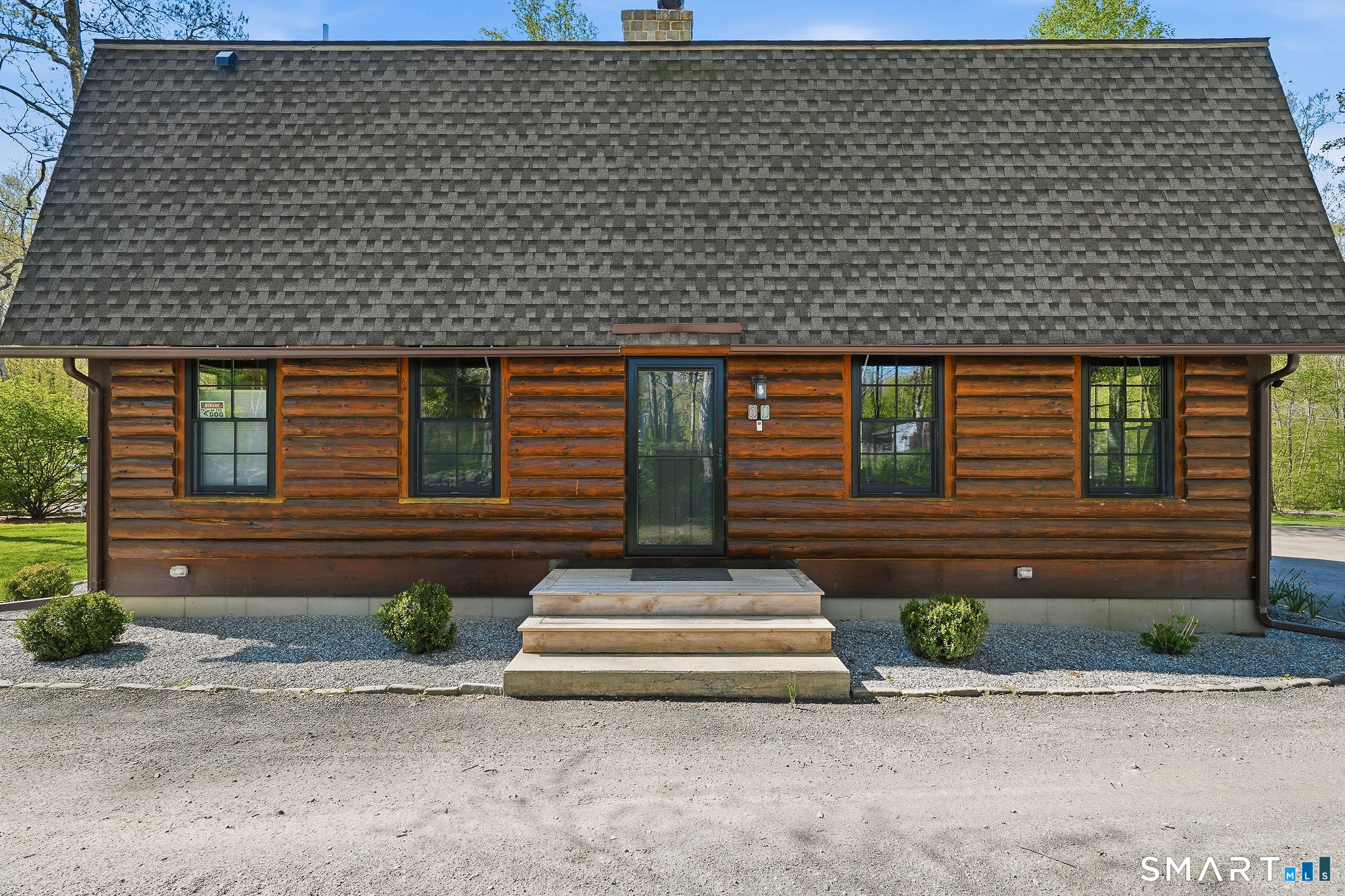 61 Mystic Road North Stonington, CT 06359 - Photo 4 of 40 a front view of a house with a yard