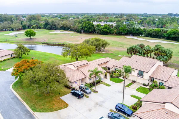 an aerial view of a house with a garden