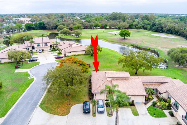 a view of a garden with a lake view
