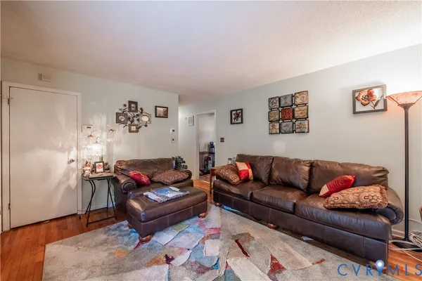 a living room with furniture and a couch