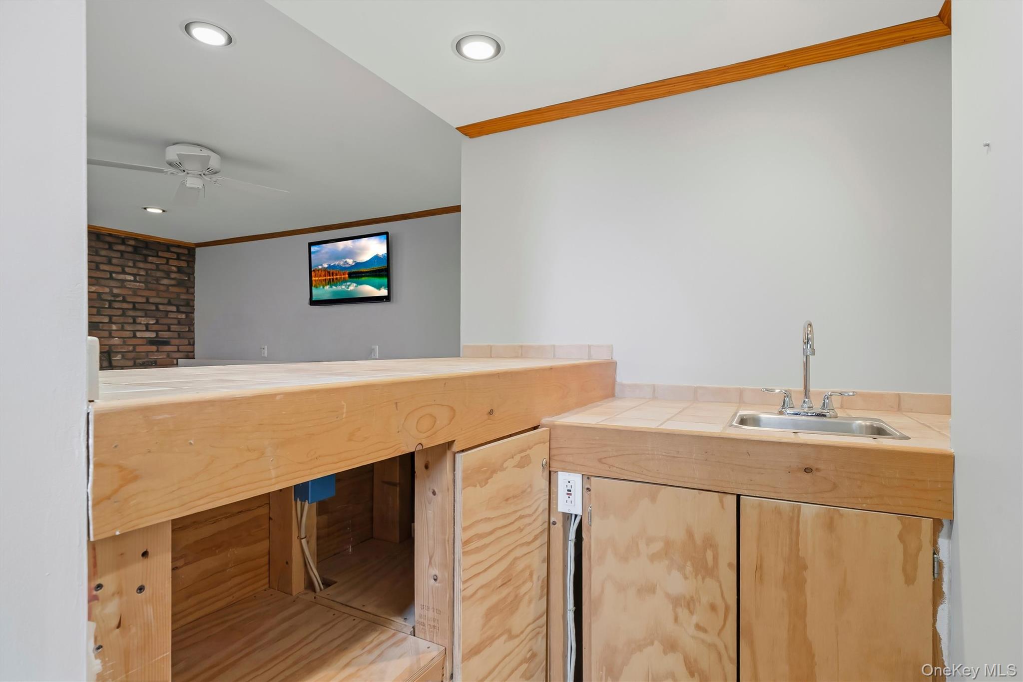 318 Beattie Road Washingtonville, NY 10992 - Photo 23 of 42 a view of kitchen with stainless steel appliances cabinets and wooden floor