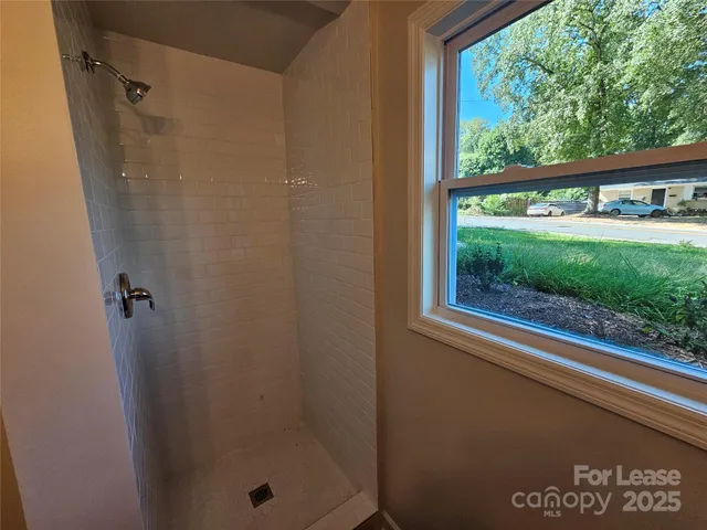 a view of a door and a window